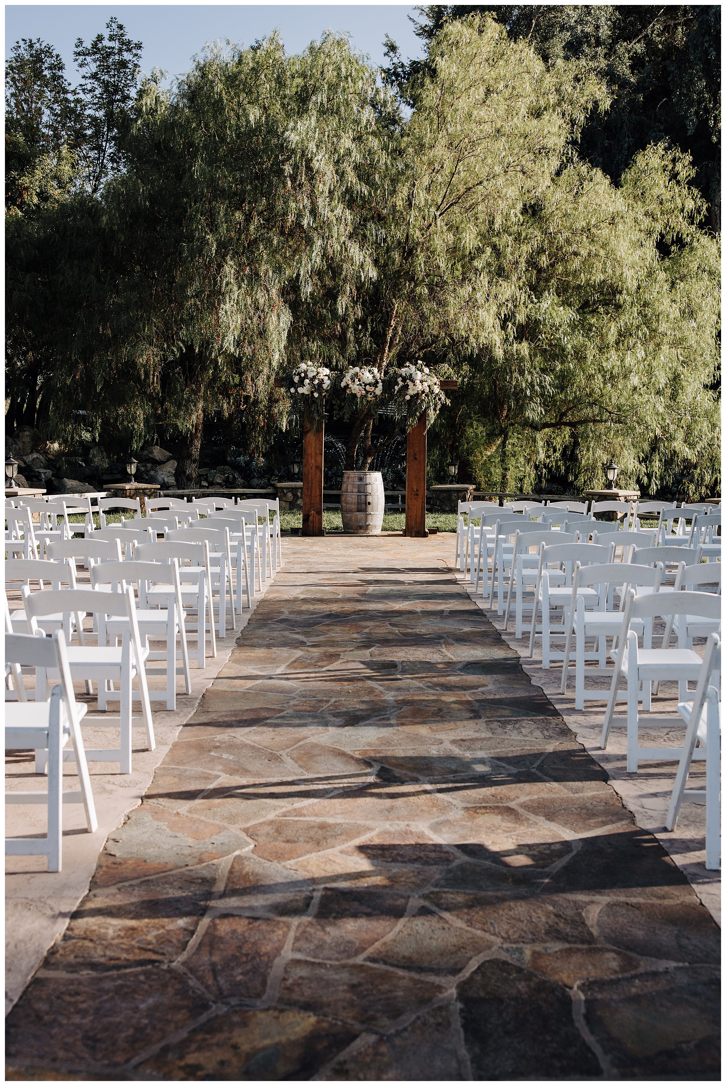 wedding ceremony setup with arbor