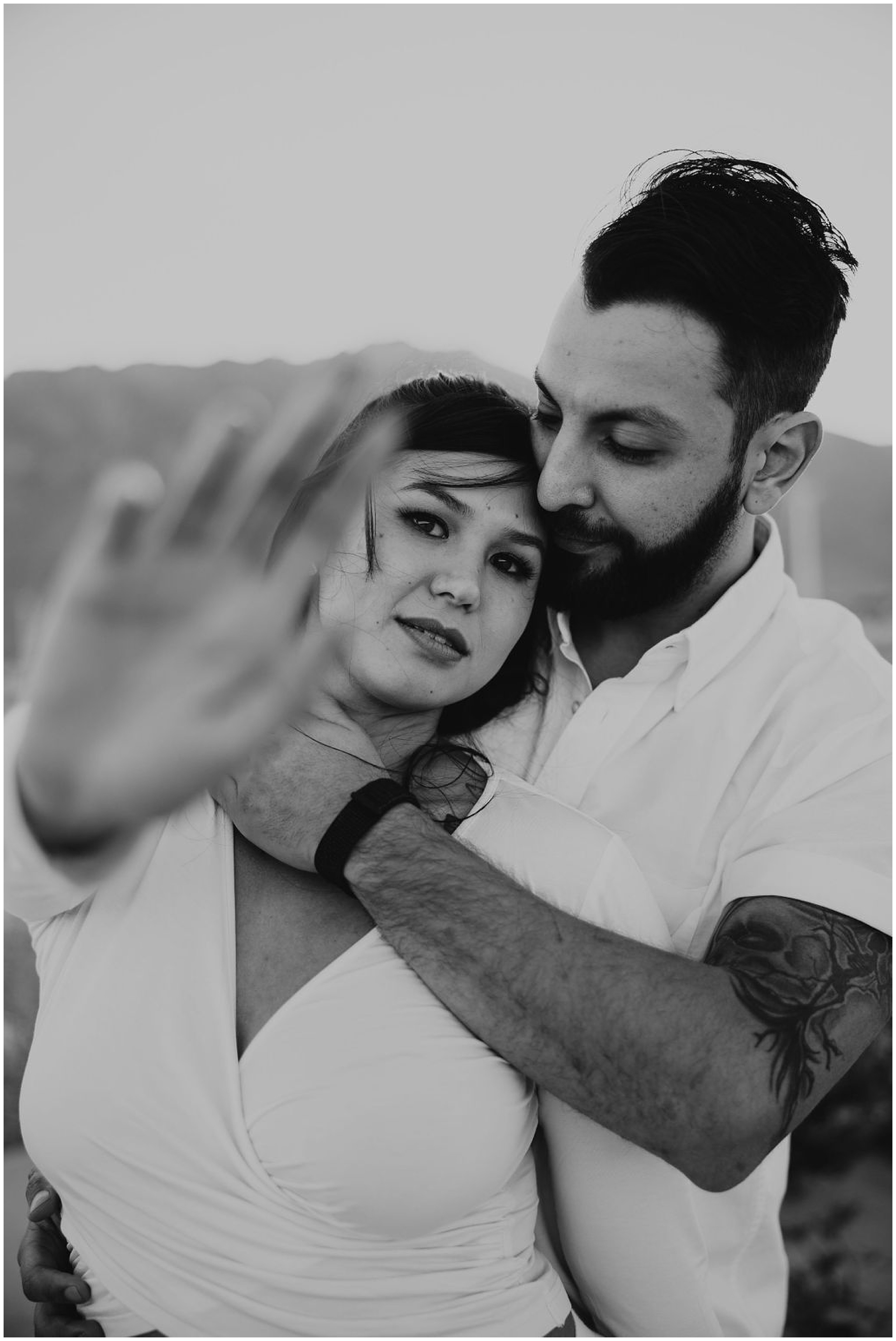 black and white photo of girl holding hand out