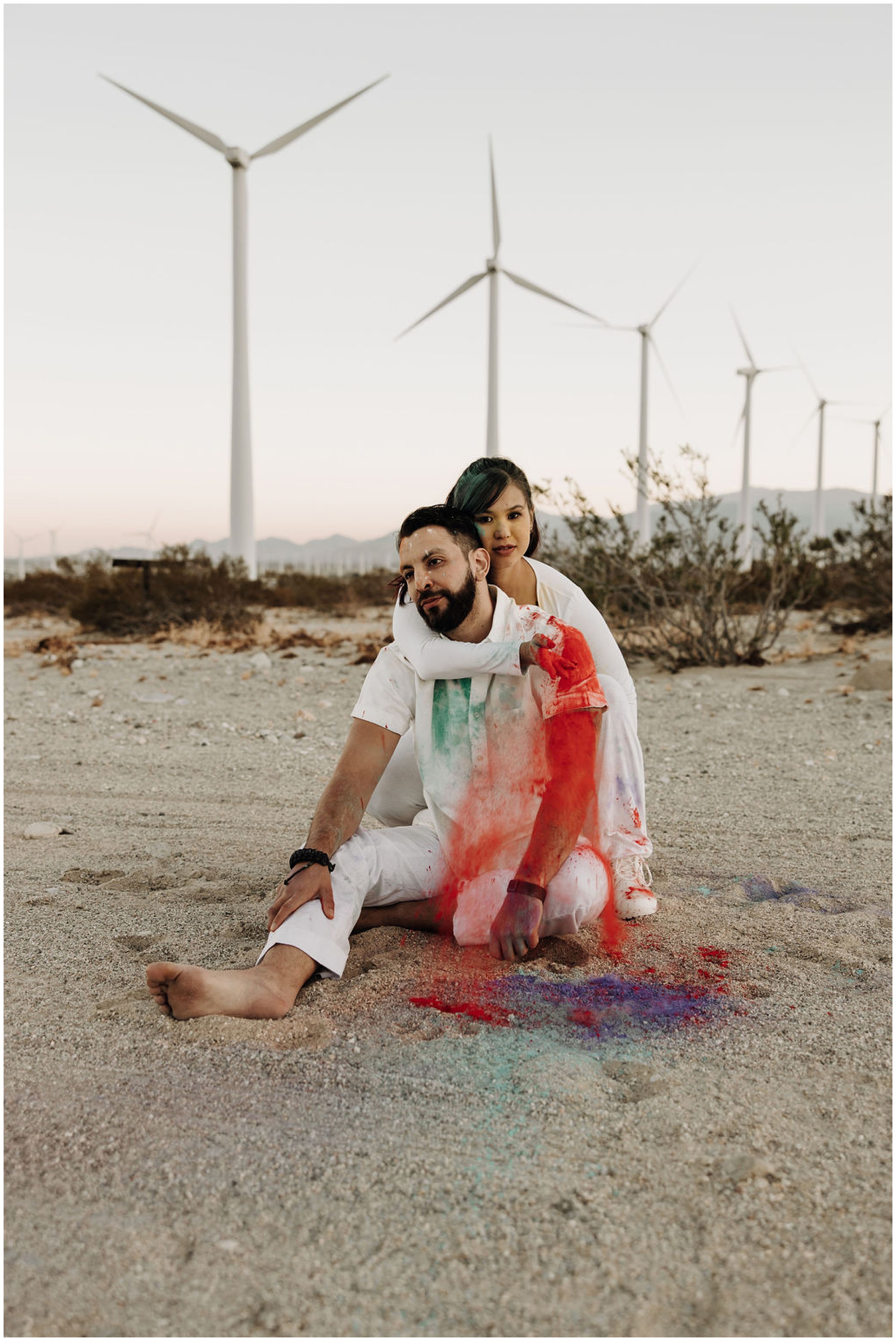couple with colored powder for photos