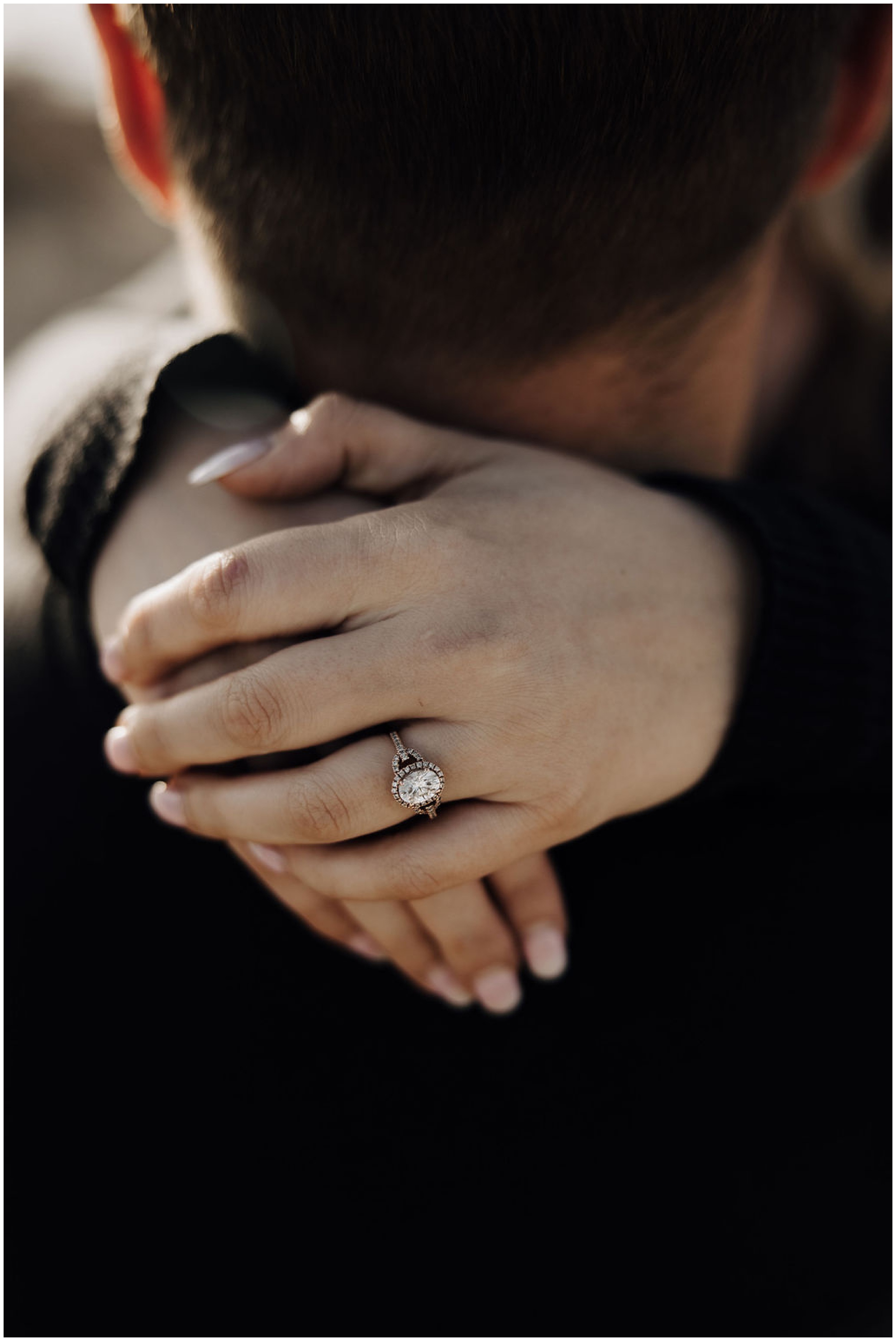girl showing off wedding ring