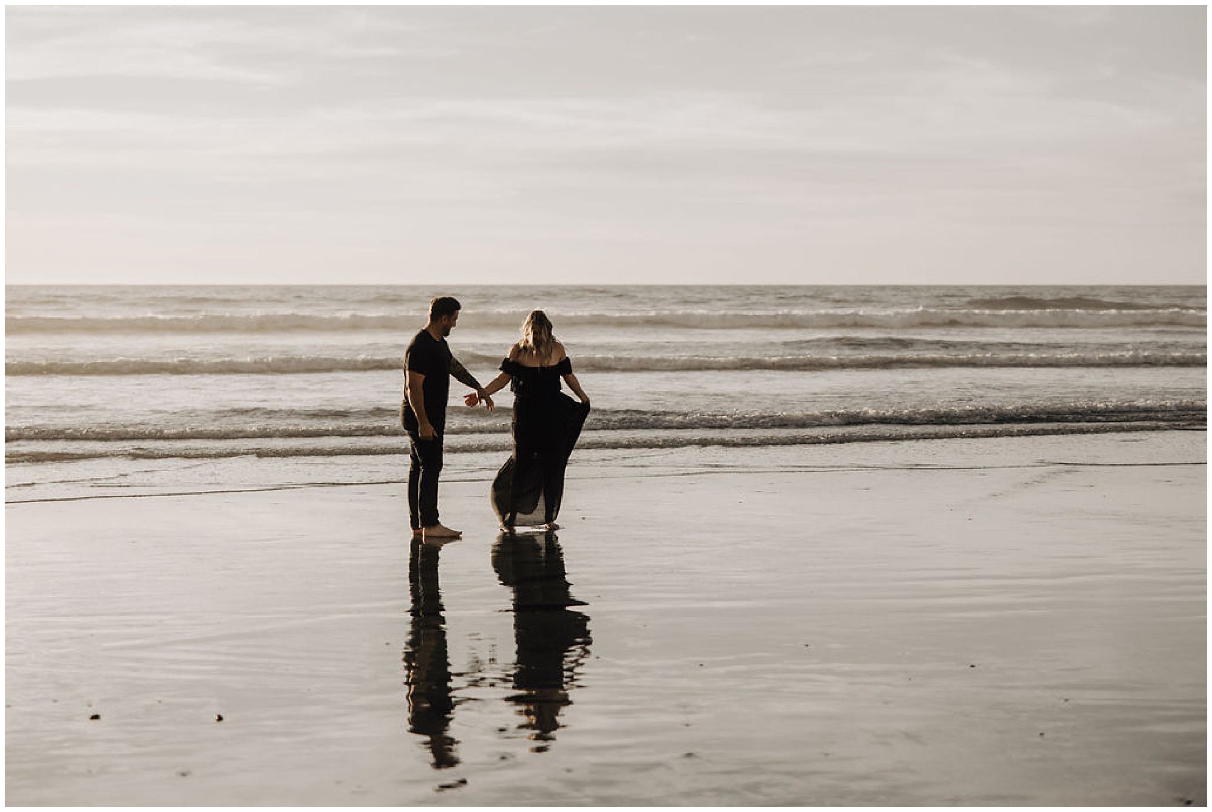 couple walking in ocean
