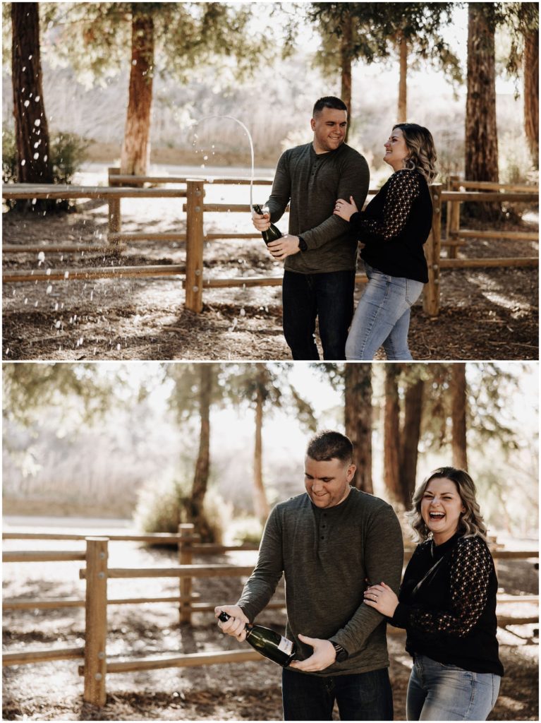 couple popping champagne