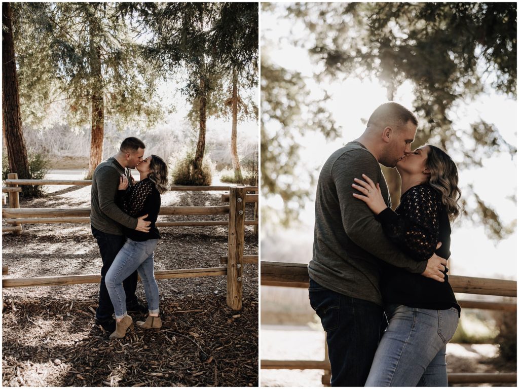 couple kissing in forest