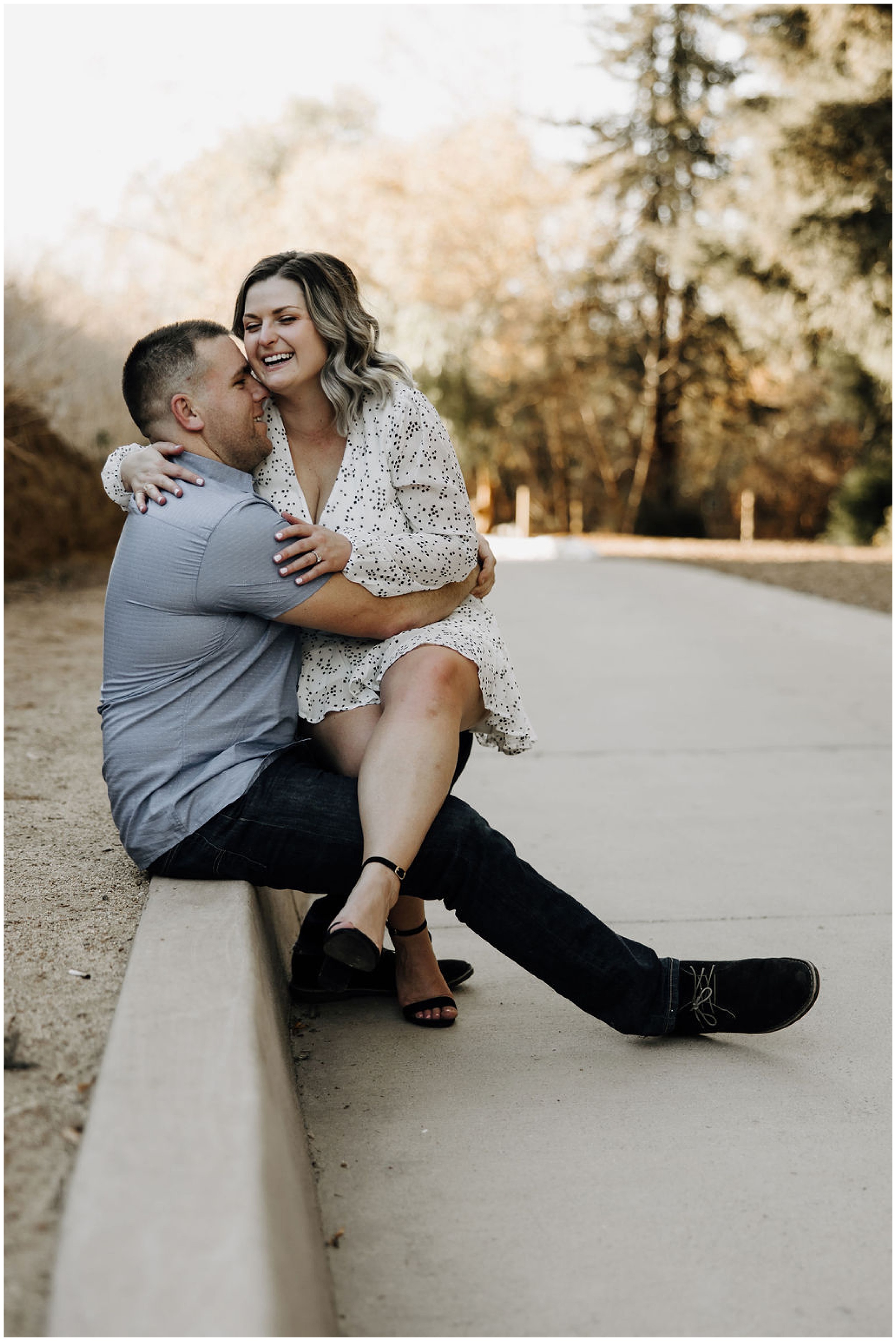 woman sitting on man's lap