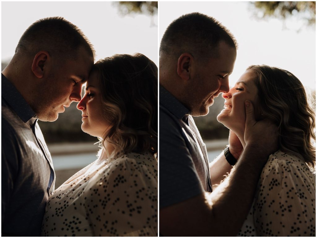 couple kissing at sunset