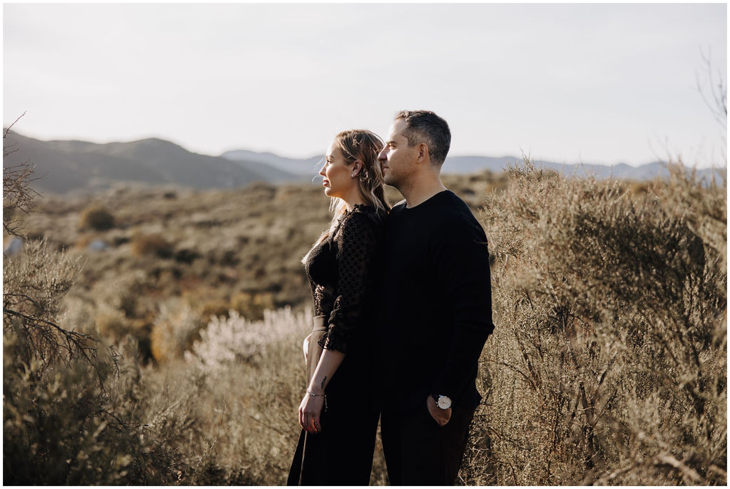 couple standing on mountain