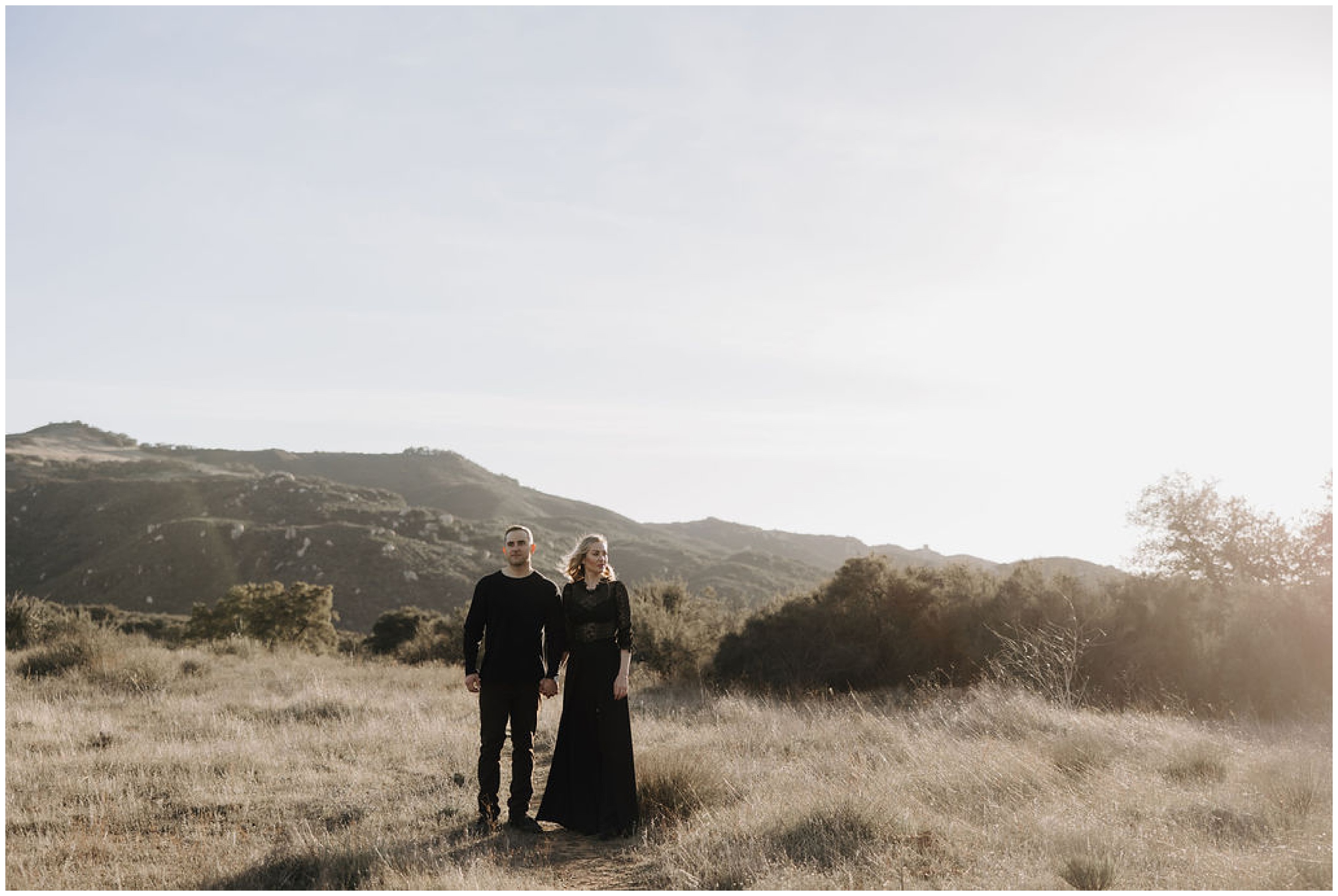 couple standing on mountain