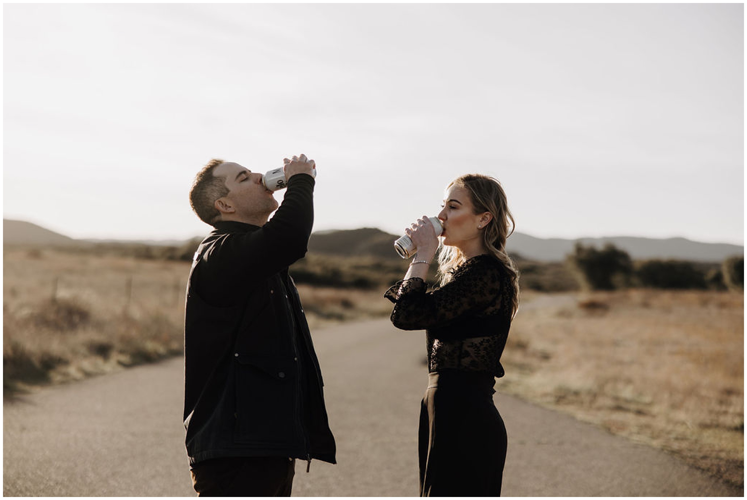 couple shotgunning beers