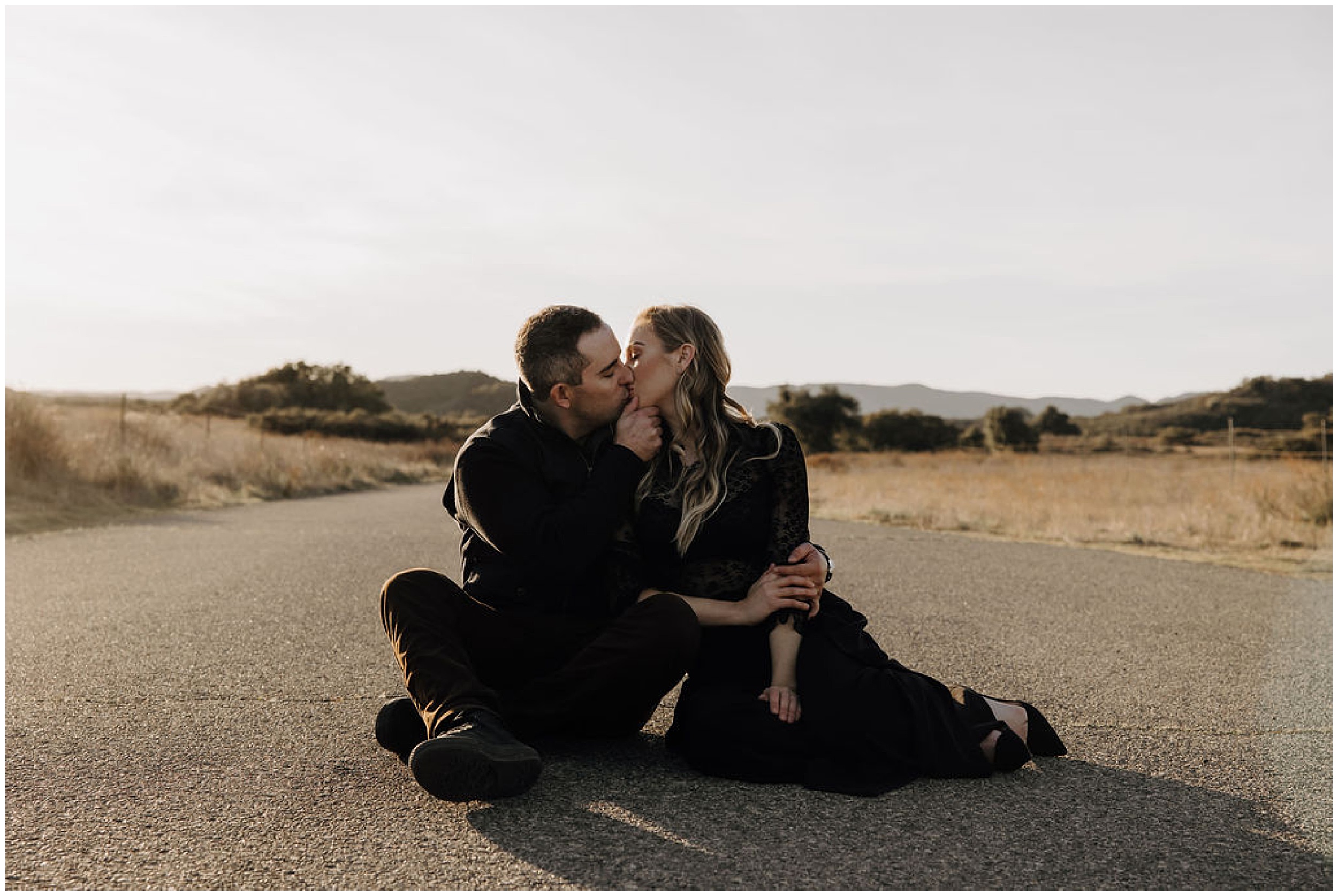 couple sitting and kissing