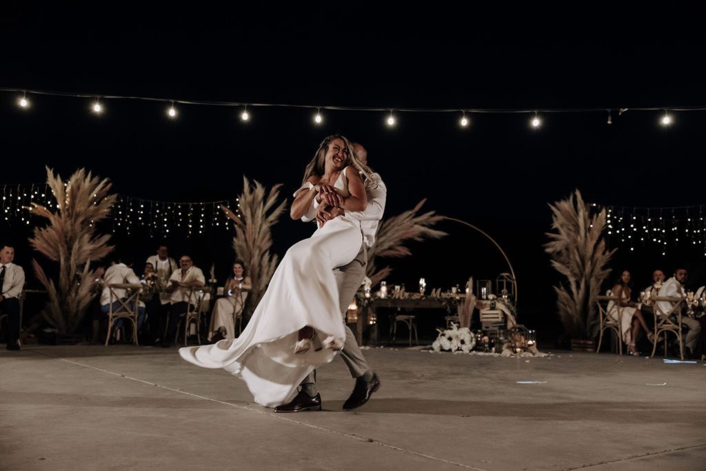 bride and groom dancing