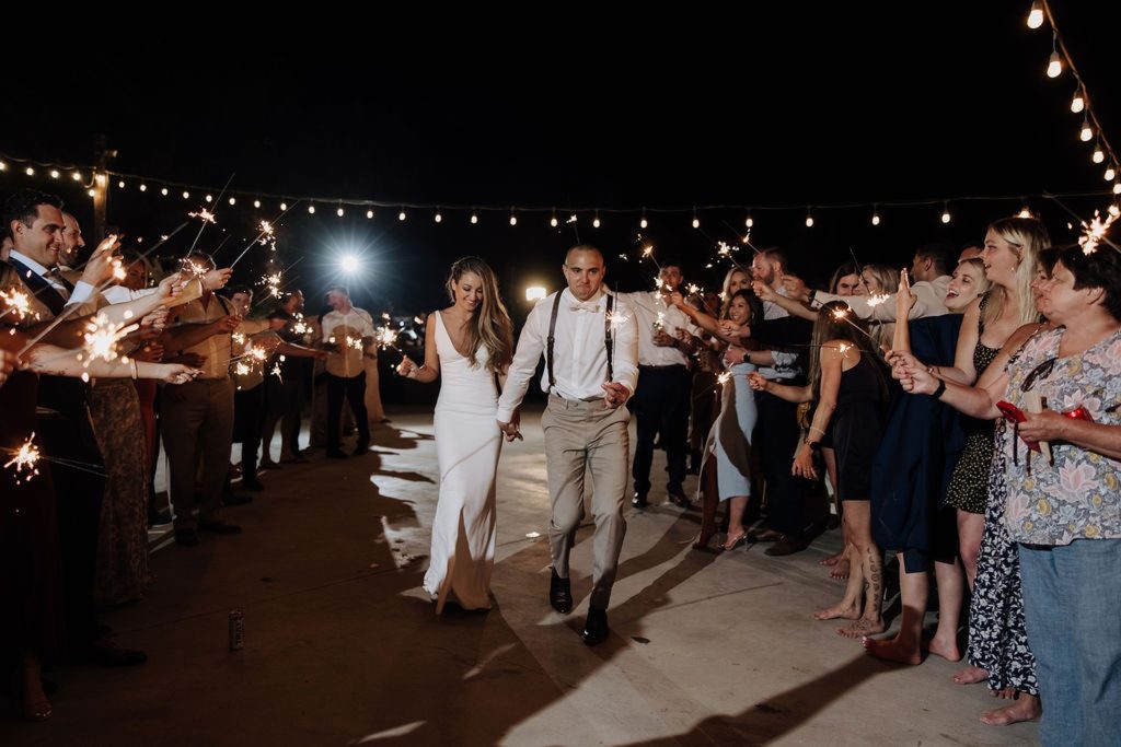 bride and groom exiting wedding