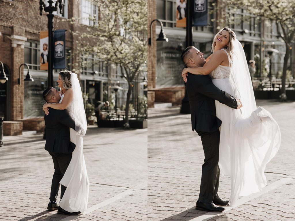 groom picking up bride